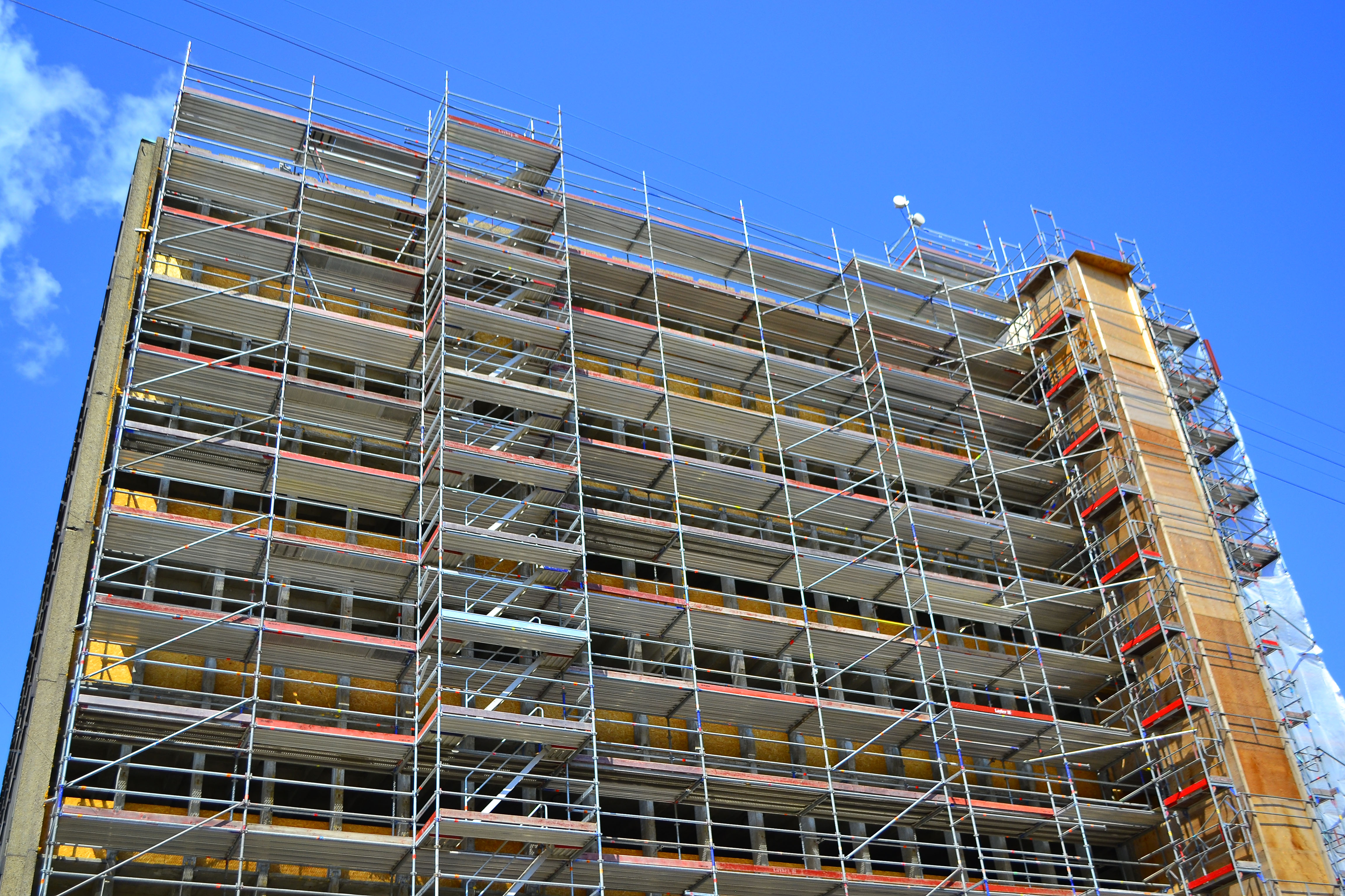 Photo of a large building with scaffolding on it