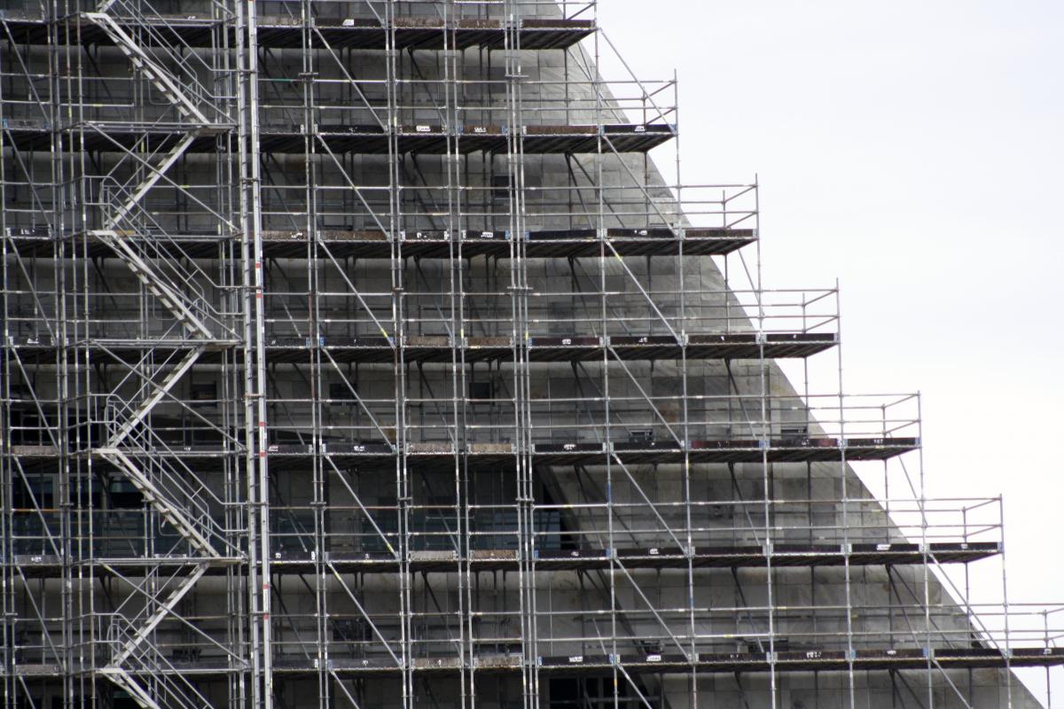 Photo of stairs to roof in facade of building
